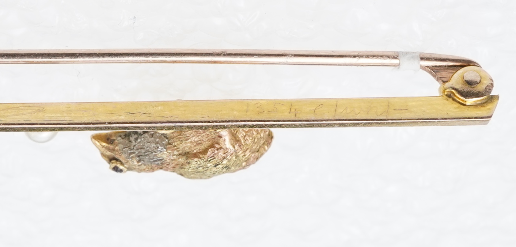 A gold and seed pearl novelty bar brooch, circa 1900